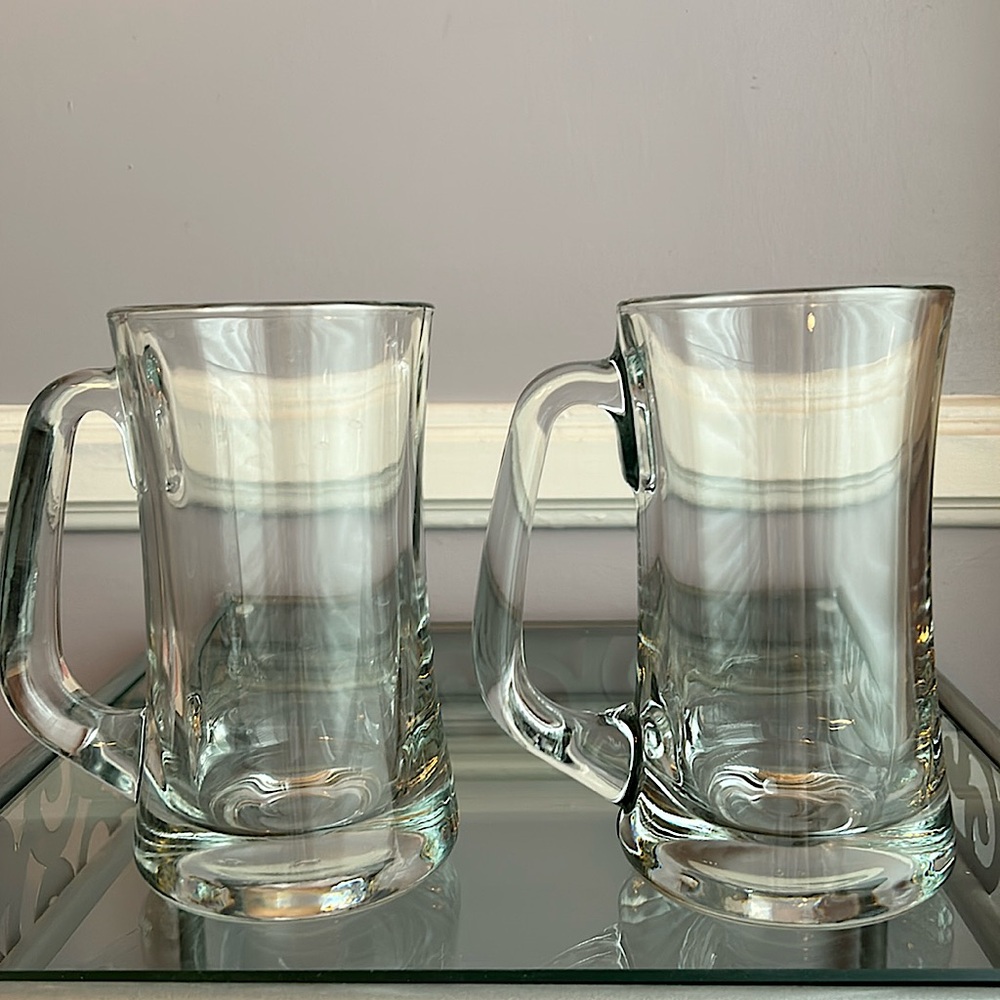 Two thick heavyweight clear glass beer mugs